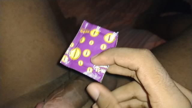 Solo black male masturbates and cums with condom